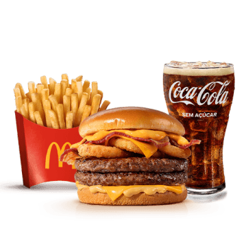 Dois hambúrgueres de carne 100% bovina, méquinese, a exclusiva maionese especial com sabor de carne defumada, onion rings, fatias de bacon, queijo processado sabor cheddar, o delicioso molho lácteo com queijo tipo cheddar tudo isso no pão tipo brioche trazendo uma explosão de sabores pros seus dias de glória! Acompanhamento e Bebida.